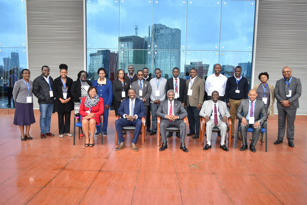 Dr. Kamau Gachigi (Seated 2nd Left), Chief Guest and Founding Executive Director, Gearbox Pan African Networks, pose for a group photo with presenters and participants after opening the Seminar. Also, in the photo is Prof Stephen Kiama (Seated Centre), UoN Vice-Chancellor, John Onyango (Seated 2nd Right), Institute's Acting Managing Director, Said Ramadhan (Right) of ARIPO and Prof. Mary Kinoti (Seated Left), Director, UoN's Intellectual Management Office of Research Innovation and Enterprise