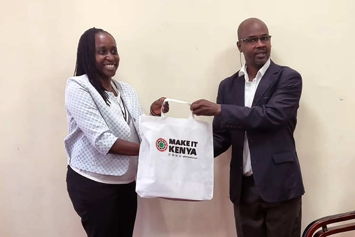 Jane Madumadu Tanui (Left), Principal Officer, Stakeholder Engagement, Kenya Export Promotion and Branding Agency (KEPROBA), presents a gift to Johanna Kibet of the Institute's Trade Mark Division, when the Agency's officers visited KIPI Centre, Kabarsiran Avenue, Off Waiyaki Way, Nairobi on 30th November, 2023.